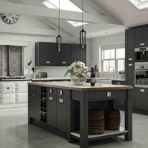 Flat door kitchen, large island, mantle and range. 