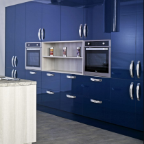 High Gloss Kitchen, Blue bank of units, Island, Large Feature Handles. 