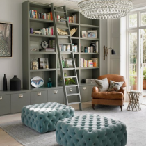 Home Library idea, contemporary style, tall shelving with ladder, floor level cabinets for additional storage