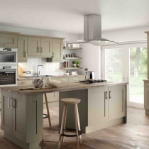Shaker style kitchen, island with hob and feature ceiling extractor. 