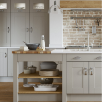 Shaker style kitchen, large island with storage, units to the ceiling. 