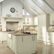 Shaker style kitchen, large island, sink on island. 