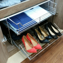 Wardrobe two tier pull out for shoes and clothing. 