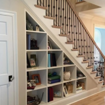 Under the stairs, cabinets & shelving to make the most of this space