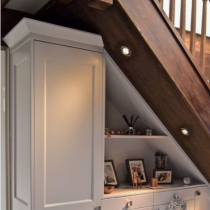 Under the stairs, cabinets & shelving to make the most of this space